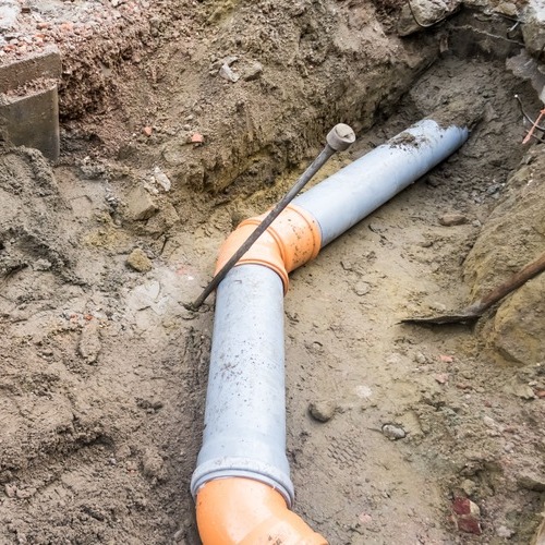 A water or sewer line repair